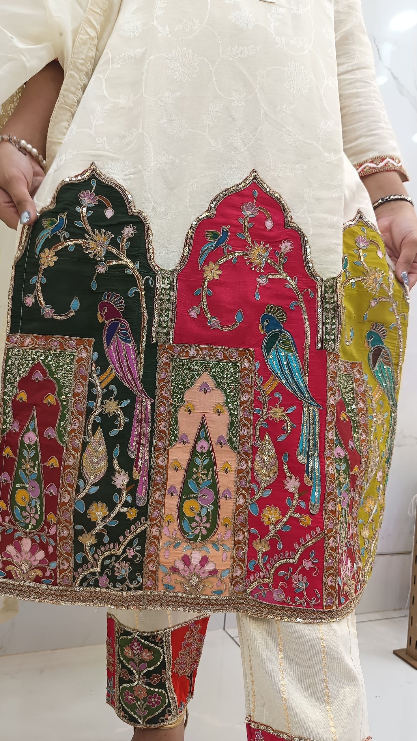 Off-White Dola Silk Kurta Set with Multicolor Embroidered Panels | Women’s Ethnic Wear